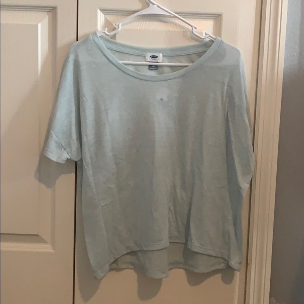 Light blue shirt.